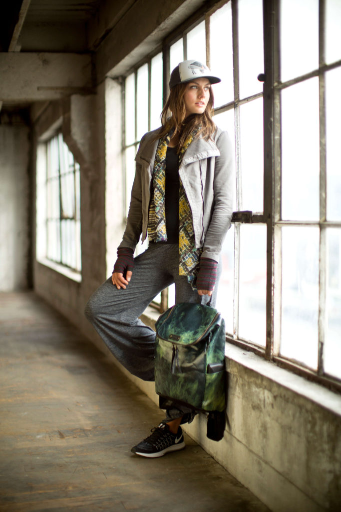 Woman with hat, scarf, hand wear and bag from the Pistil fall 2106 collection.