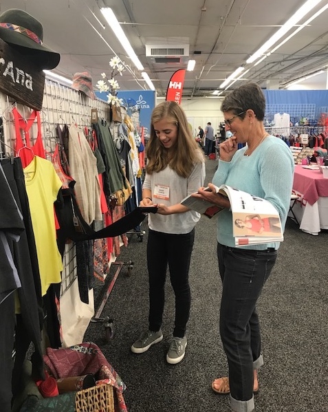 Suzi's daughter Siena working the EORA Summer 2017 show with her mom.